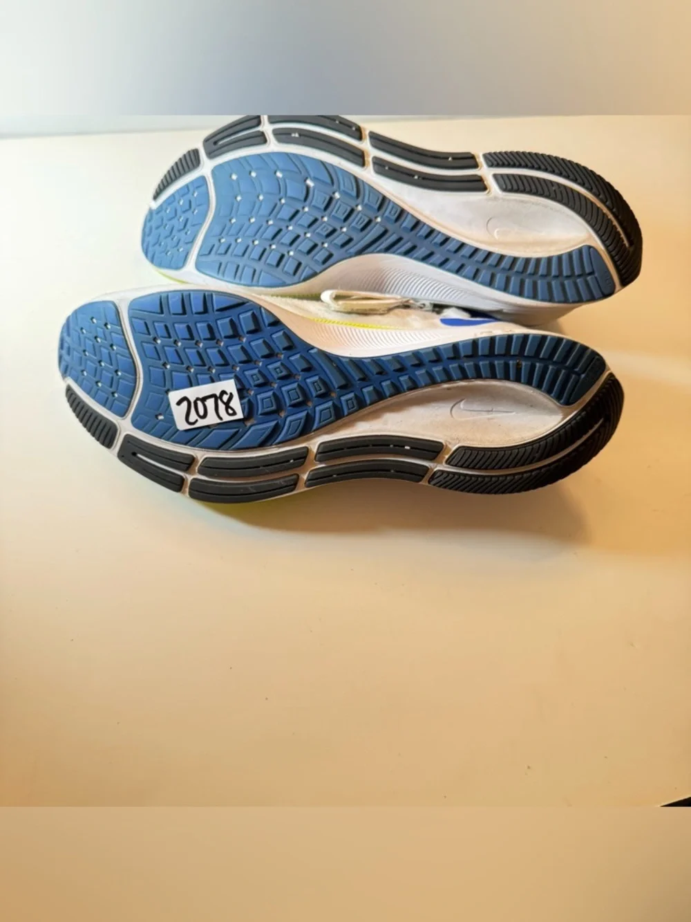 Nike Men's White and Blue Boat-Style Running Shoes with Yellow Accents